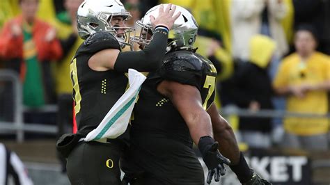 Nix throws 4 TD passes and runs for 2 more scores in No. 6 Oregon’s 63-19 rout of California